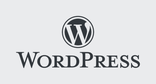 لوگوی وردپرس و نوشته WordPress روی زمینه خاکستری روشن